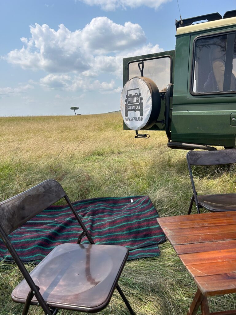 Safari Lab team enjoying a mid safari lunch in the wild at Mara