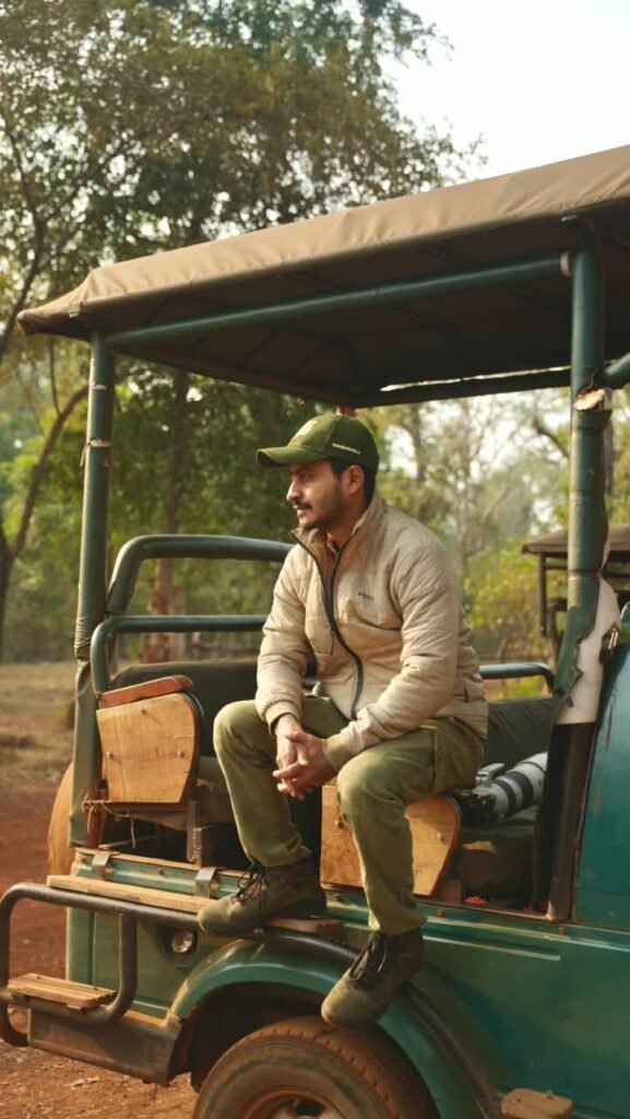Safari Lab in the field beside a safari vehicle in India