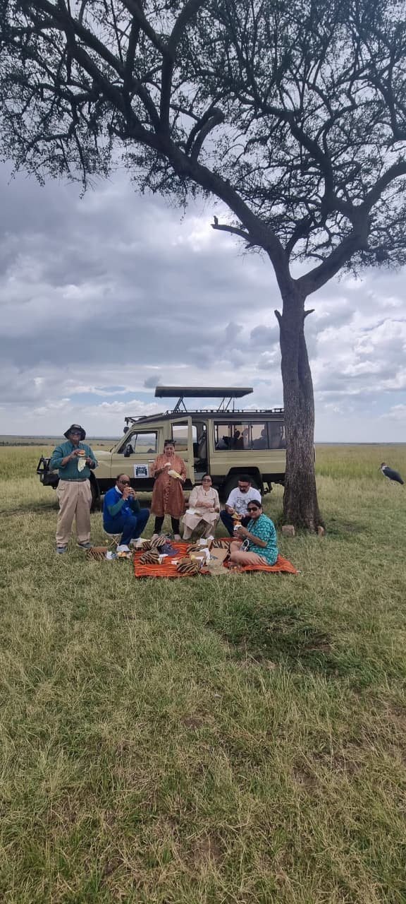 Safari Lab guests enjoying lunch in the bush at Masai Mara